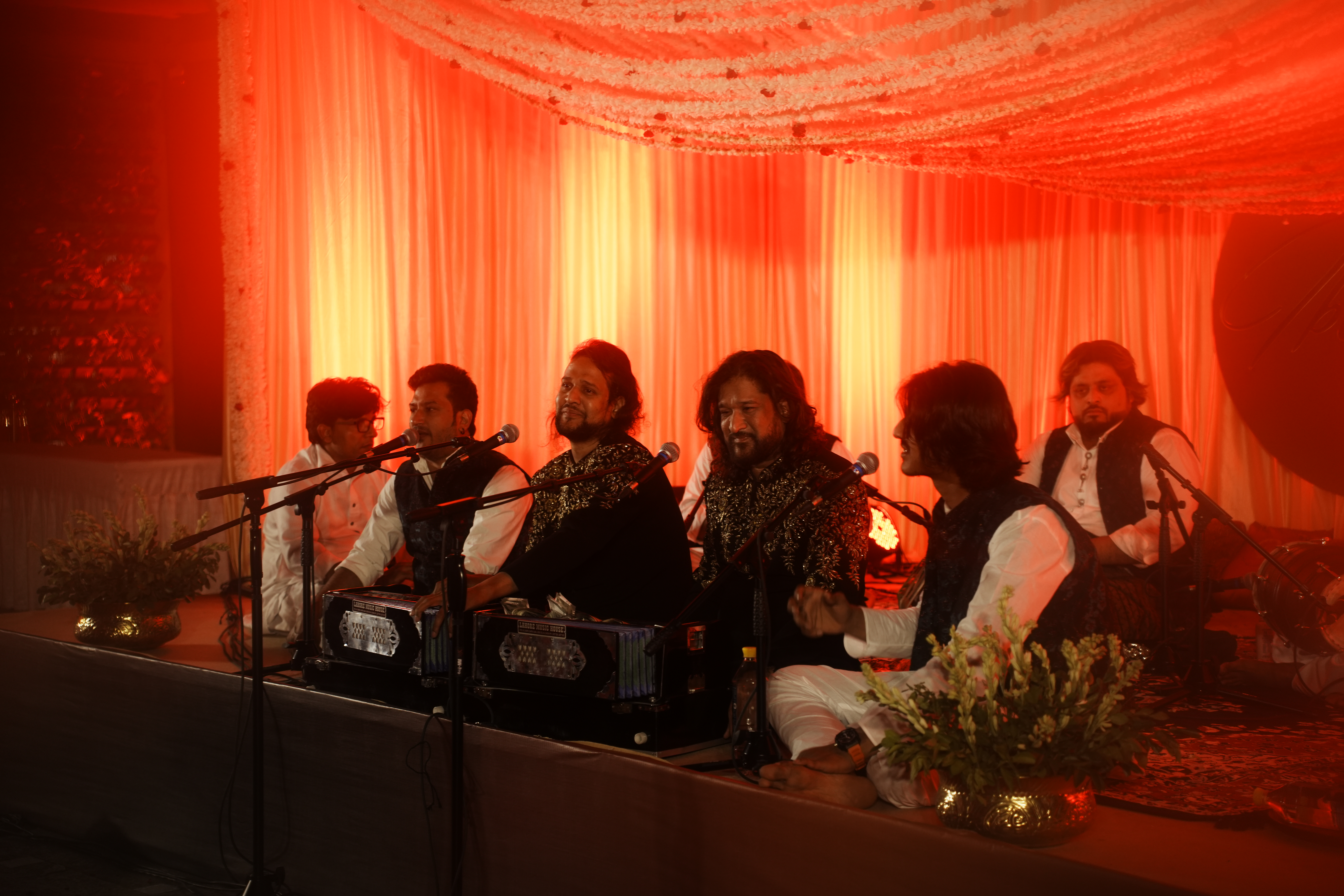 Nizami Bandhu performing qawwali at a wedding